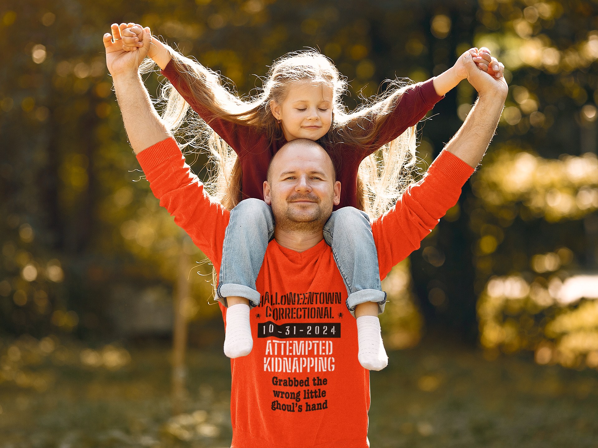 man holding a girl wearing a shirt halloweentown correctional attempted kidnapping grabbed the wrong little ghoul's hand family costume