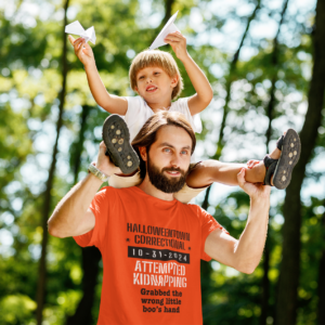 man holding boy wearing shirt halloween town correctional attempted kidnapping grabbed the wrong little boos hand family costume