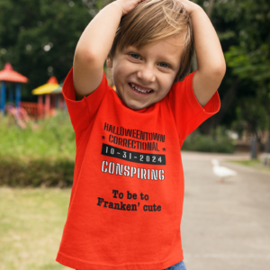 little boy wearing an orange shirt that says HalloweenTown correctional conspiring to be too franken' cute family costume