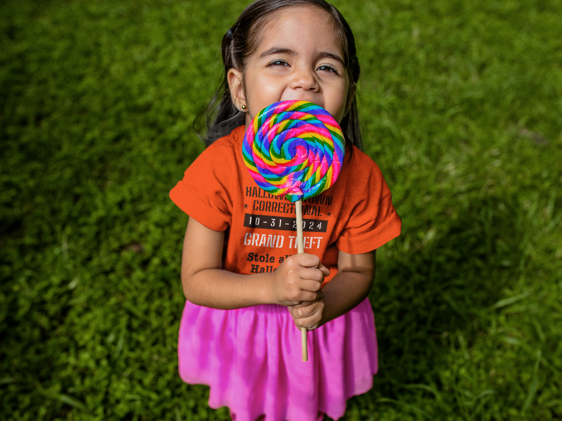 girl eating candy wearing a shirt halloweentown correctional grand theft stole all the halloween candy