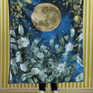 plush blanket featuring a full moon in a night sky peeking through leaves and flowers