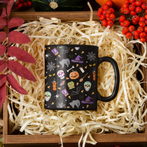 black mug featuring pattern of cute spooky images