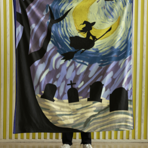 plush blanket with a witch flying over a graveyard past a starry night moon background